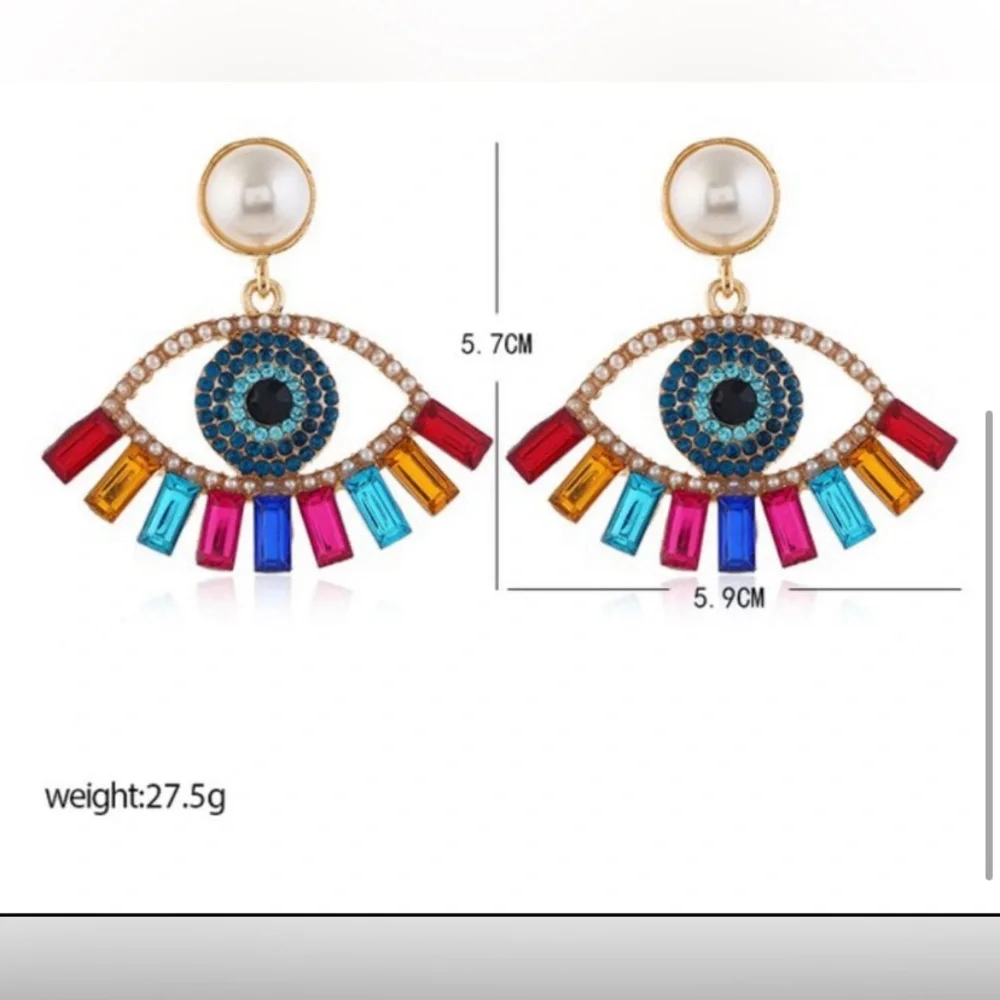 Rhinestone Evil's eye earrings in White and gold